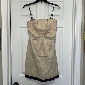 BCBG Paris Gold with black trim cocktail mini dress